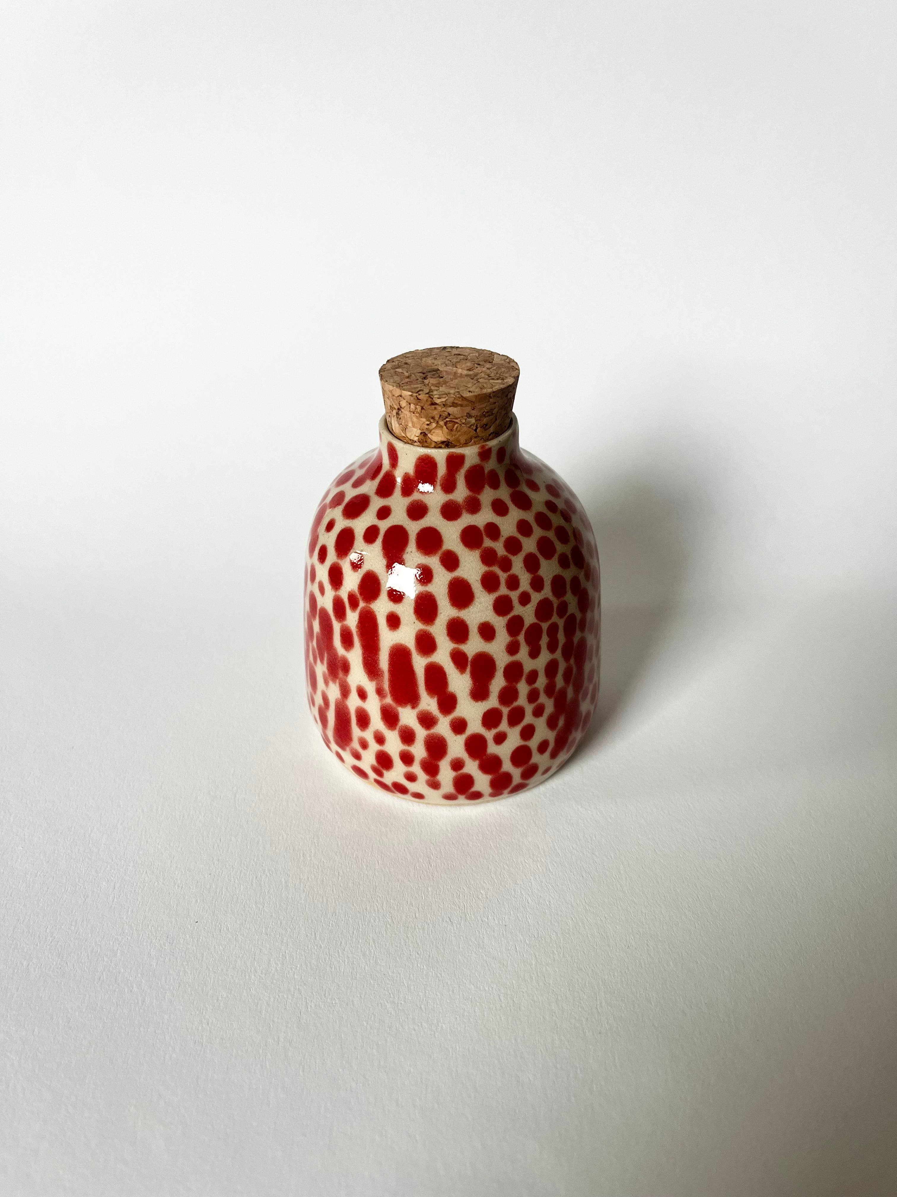 Ölflasche red dots